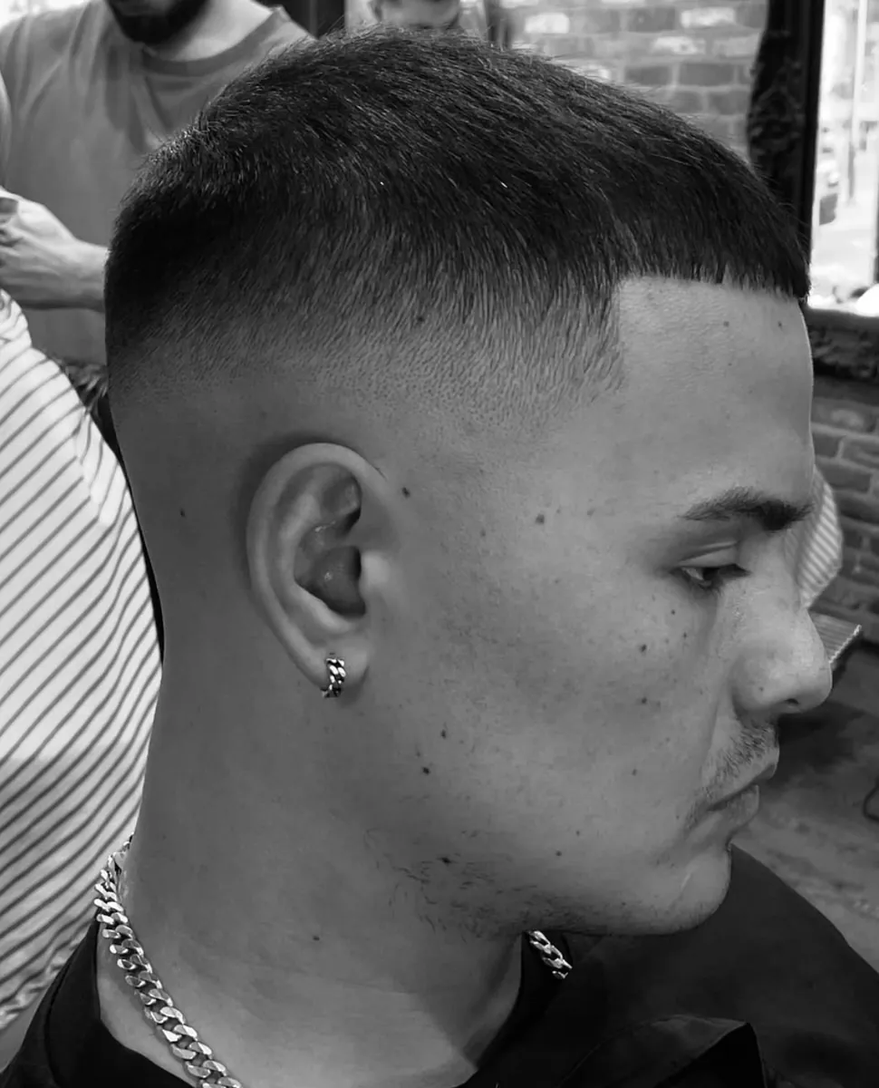 Sharp skin fade by Mo at KAMO 366 barbershop, Manchester